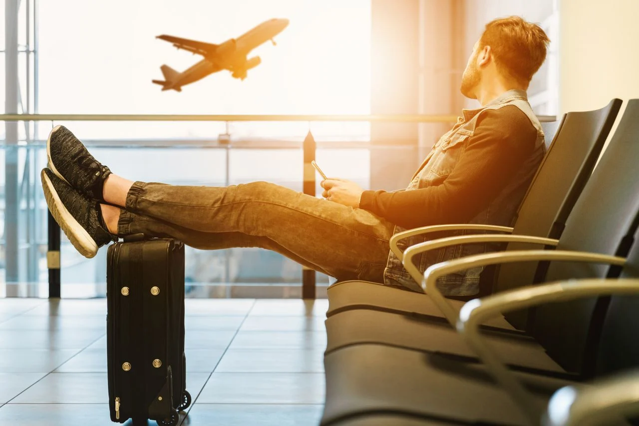 Man waiting at airport terminal